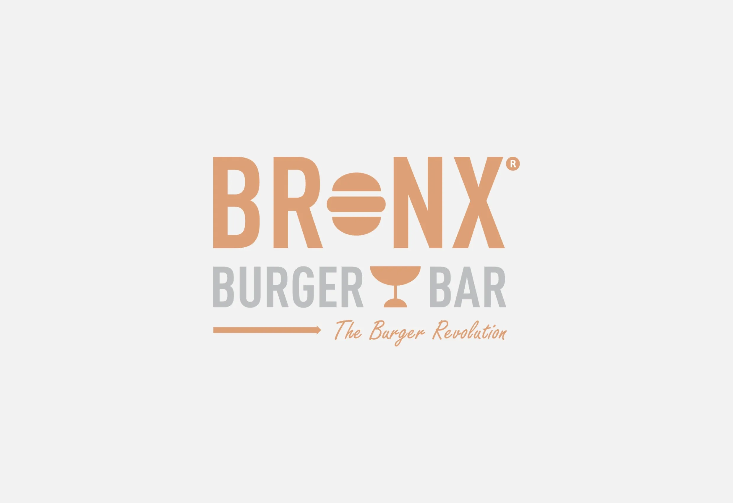 Bronx Burger Bars logotyp, ”Bronx” med en hamburgare som ett o, över texten ”Burger Bar”, i orange och grått
