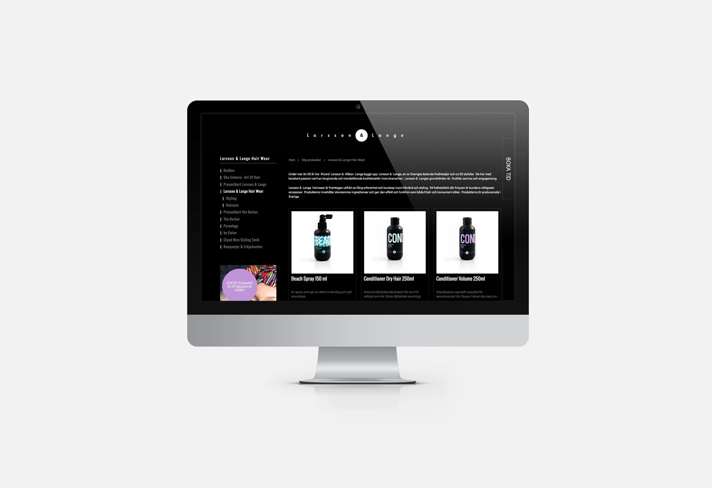 Webbshopen på en datorskärm i svart design med hårprodukter i flaskor