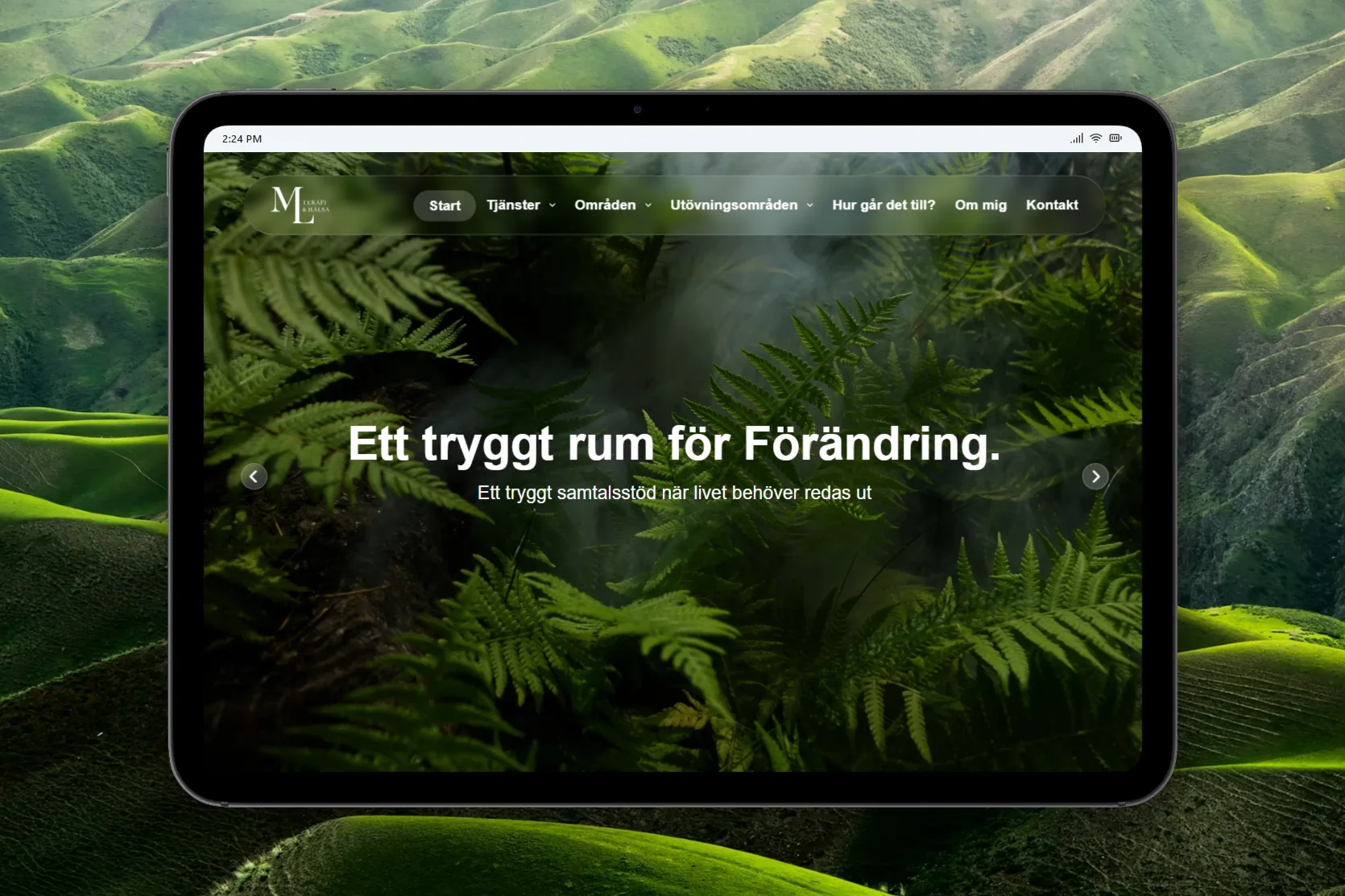 Startsidan på en surfplatta: ormbunkar i ett grönt landskap under rubriken ”Ett tryggt rum för förändring”