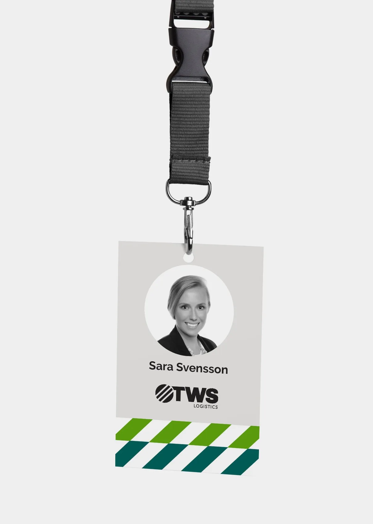 Ett passerkort med foto i ett nyckelband, med TWS logotyp och gröna band